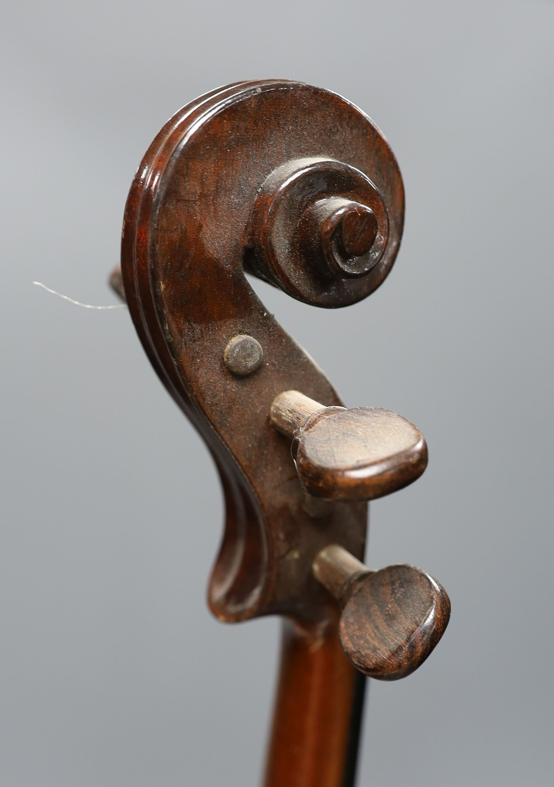 A cased 19th century violin